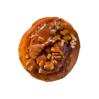 Brioche caramel pecan, a round brioche topped with caramel and toasted pecans
