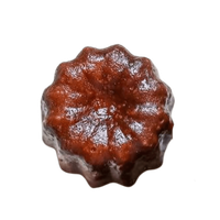 Canelés with a dark caramelised crust